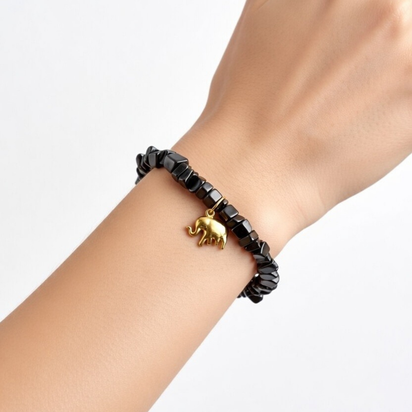 Pulseira de Hematita com Elefante Dourado / Proteção e Equilíbrio